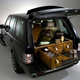 Illustration for article titled The Boozemobile: A Land Rover Outfitted With Guns, Spirits